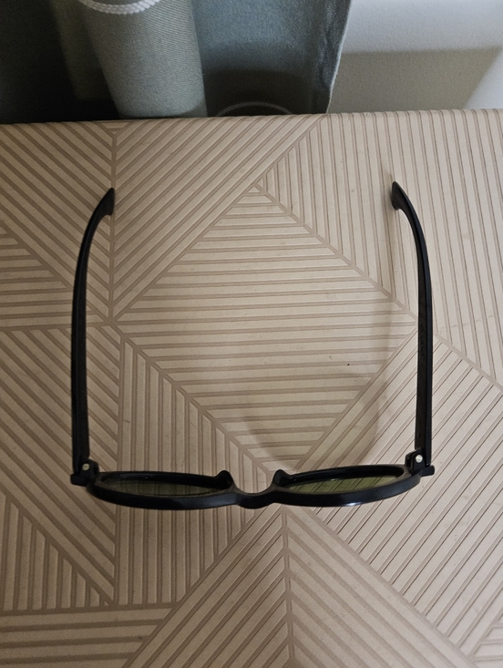 Polaroid Black Frame Sunglasses with Green Lenses